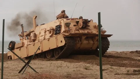 Abrams assault breacher vehicle reverse tracking over sand Stock Footage 101517163