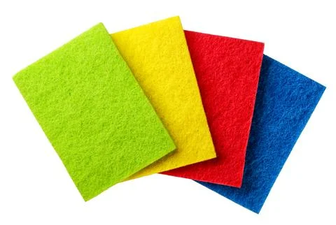 Abrasive sponge close-up on a white background. Top view Stock Photos