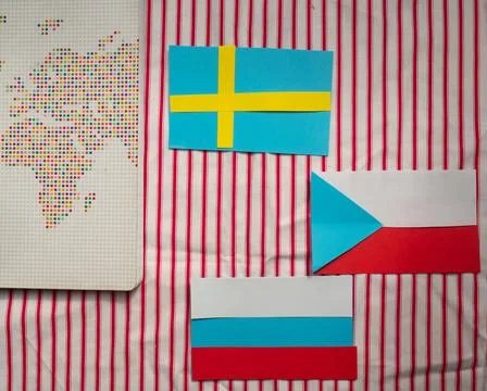 Abroad: abstract map of the world, flags of Sweden, Czeck Republic and Russia Stock Photos