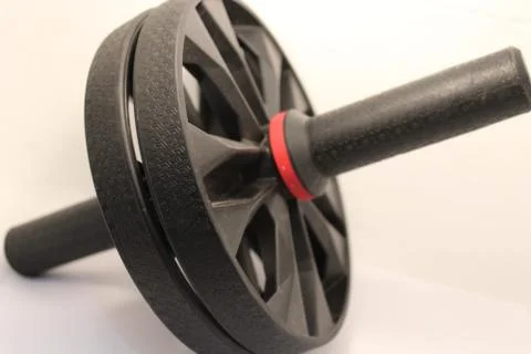 Abs roller physical exercise equipment for exercise at indoor and gym Stock Photos