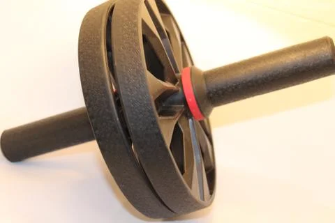 Abs roller physical exercise equipment for exercise at indoor and gym Stock Photos