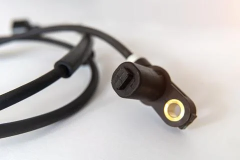 ABS sensor close-up on white background. Stock Photos