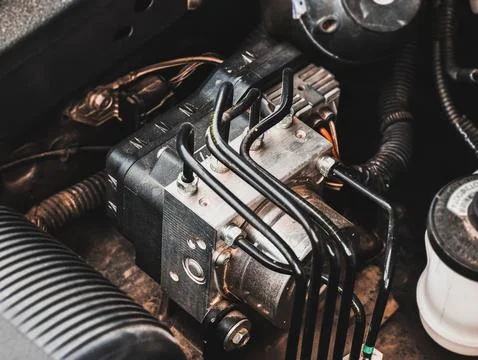 ABS unit module control box with pipes of car brake system Stock Photos