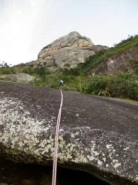 Abseiling from Dedo de deus mountain Stock Photos
