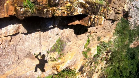 Abseiling down a cliff at Oribi Gorge Stock Footage 116276070