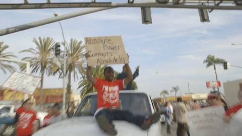 Absolute Power Corrupts Absolutely - man holding sign Stock Footage 77739828