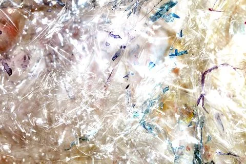 Absract background of shiny plastic and bubbles dreating bright sci-fi styl.. Stock Photos