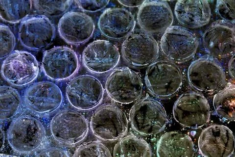 Absract background of shiny plastic and bubbles dreating bright sci-fi styl.. 스톡 사진