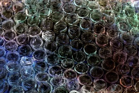 Absract background of shiny plastic and bubbles dreating bright sci-fi styl.. Stock Photos