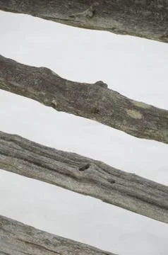 Abstact angled stripy rustic split cedar rail fence Stock Photos