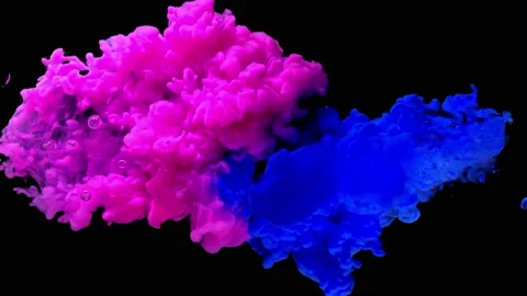 Abstarct color paint ink drops in water in slow motion. Ink swirling underwater. Stock Footage 101241623