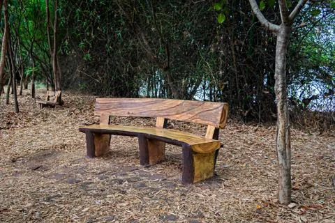 Abstarct , uniquely designed , isolated image of  curved wooden bench made of Stock Photos