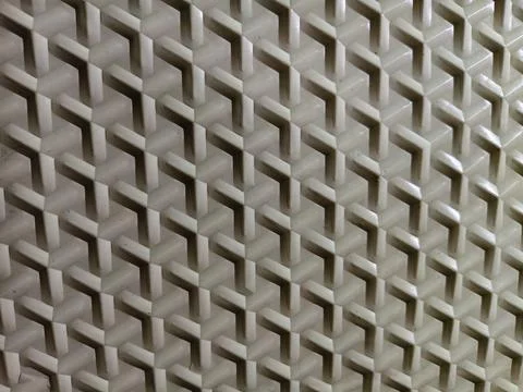 Abstract 3D geometric pattern background with repetitive white arrow shapes 库存照片