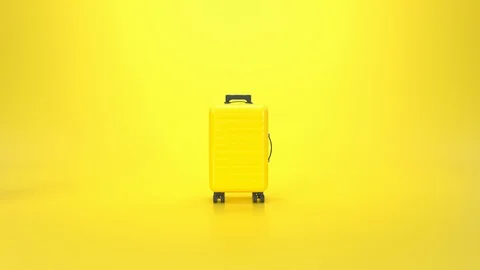 Abstract 3D render of yellow suitcase on yellow background rotating and rolling  Stock Footage 126143326