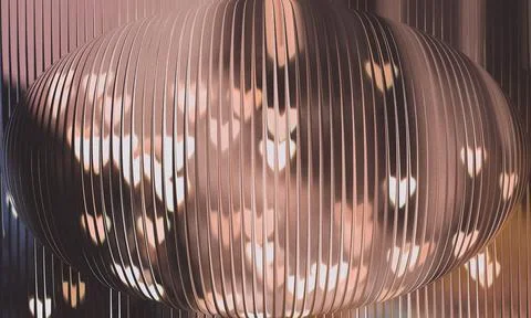 Abstract 3D sphere with heart-shaped bokeh lights seen through a vertical r.. 스톡 일러스트