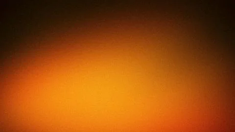 Abstract 4K background with grainy texture and warm blurred gradient in ora.. Stock Photos