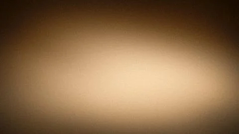 Abstract 4K background with grainy texture and soft blurred gradient in sep.. Stock Photos