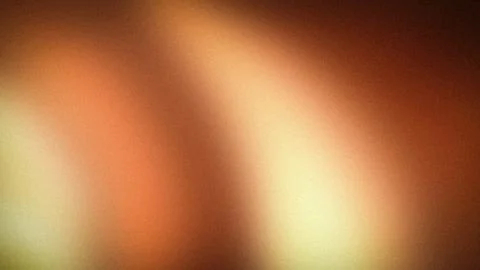 Abstract 4K blur background with warm orange brown and beige grainy gradien.. Foto stock