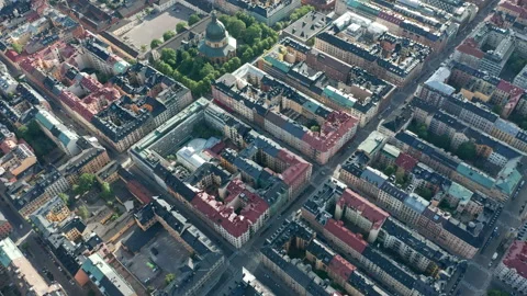 Abstract aerial drone footage of rooftops and streets in dense area Stock Footage 137132453