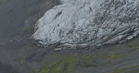 Abstract Aerial Looking Down on Crevassed Glacial Terminus 스톡 동영상 321687670