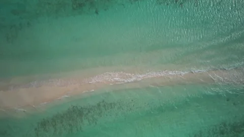 Abstract Aerial Ocean Texture and Sandbar Pattern Tropical Water 4K Stock Footage 334787024