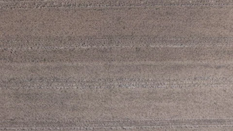 An abstract aerial perspective captures a cultivated agricultural field Stock Footage 340203891