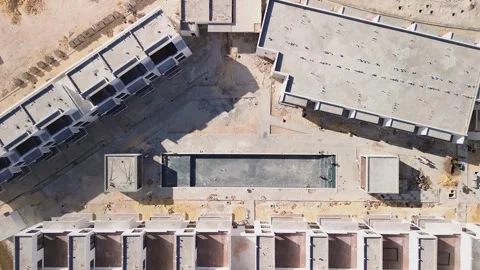 Abstract Aerial View of Under Construction Residence with Empty Pool. Zoom Out Stock Footage 270374229
