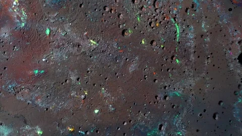 Abstract Alien Planet Surface with Colorful Mineral Glows and Impact Craters Stock Footage 336031371
