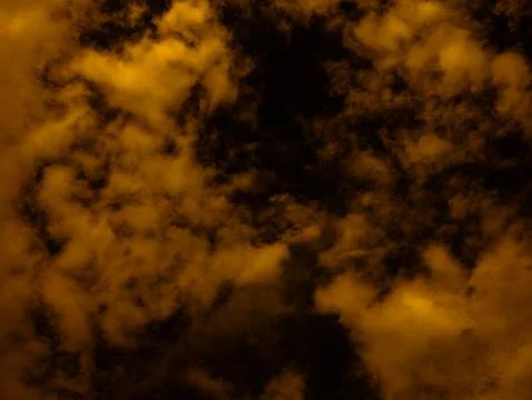 Abstract Amber and Black Cloud Texture, Surreal Fire-Toned Sky Background P.. Stock Photos