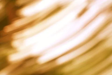 Abstract amber light trails create an ethereal background effect Stock Photos