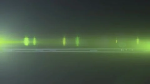 Abstract anamorphic lens flare light effect on a dark background Stock Footage 346199176