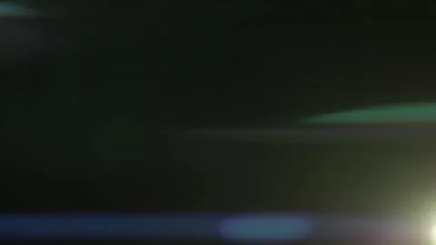 Abstract Anamorphic Lens Flare With Soft Light Streaks and Bokeh Effects Stock Footage 286304726