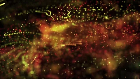 An abstract and dynamic visual of colorful, glowing particles Stock Footage 313024550
