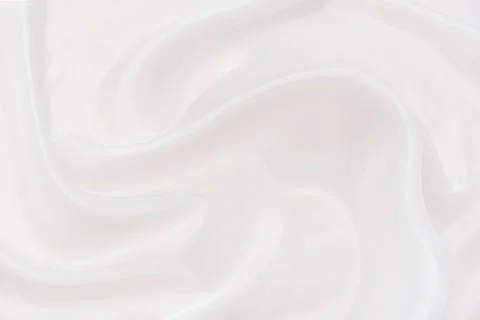 Abstract and soft focus wave of white or ivory fabric background, white ivory Foto stock