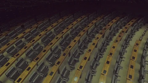 Abstract angle stabilised shot sweeping over the deputies chairs in the Lower Vídeos de archivo 126107865