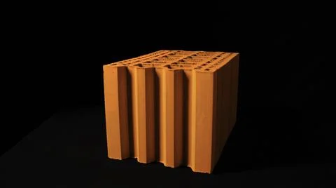 Abstract animation of 3d orange brick surface on the black background. Stock Ilustración de archivo