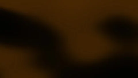 Abstract animation background. Orange light leak flash effect on black Stock Footage 315529317