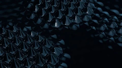 Abstract animation of black magnetic fluid spike array undulating Vídeos de archivo 345291413