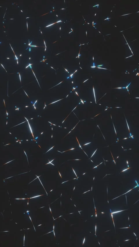 An abstract animation captivates with shimmering light patterns on a dark Stock Footage 316600378