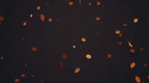 Abstract animation with falling autumn leaves and stars against dark backgr.. Video stock 340917569