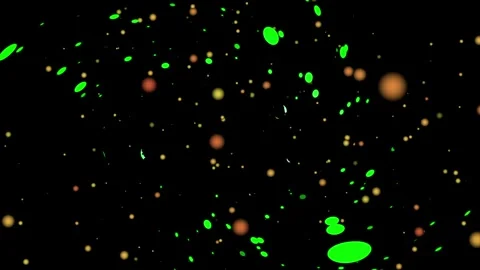 Abstract animation of floating green and yellow particles against a black. Stock Footage 319217404