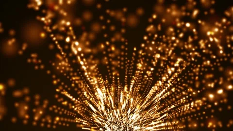 An abstract animation of glowing golden particles converging into a shining Stock Footage 320242347