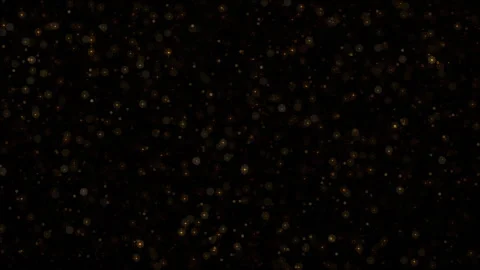 Abstract animation loop glow gold stars dust particles on black background Stock Footage 312618132