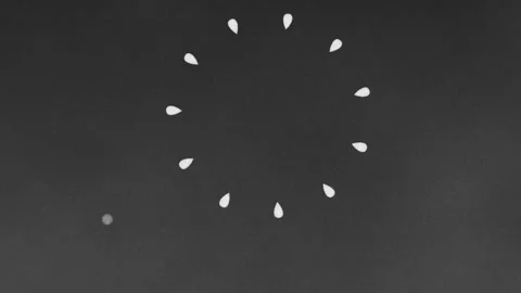 Abstract animation of multiplying particles in a circular motion. Видео 340620599