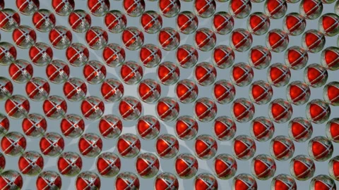 Abstract animation of red-gray metal spheres rotating on a gray background. loop Stock Footage 154031865