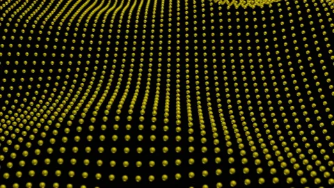Abstract animation of simple golden dots pattern. Yellow warping dots pattern Stock Footage 227622246