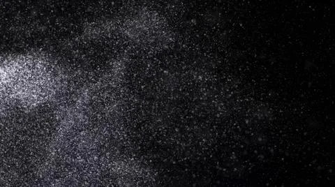 Abstract animation of small white particles exploding isolated on black Stock Illustration