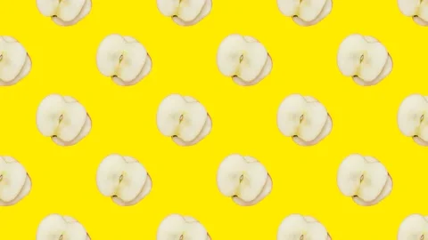 Abstract Apple Slices Loop. Fruit Pattern on Yellow Stock Footage 222318501
