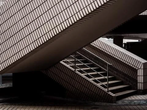 Abstract architectural composition featuring geometric staircases and tiled.. Stock Photos