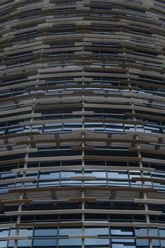 Abstract Architectural Design Featuring Layered Patterns of Glass and Metal.. Stock Photos